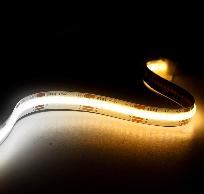 A flexible LED strip light glowing with a blend of warm and cool white light, showcasing its versatility in lighting design.