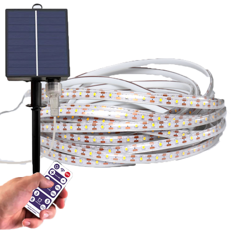 Solar-powered **COB LED Strip Lights** with remote control, perfect for outdoor lighting applications such as gardens, patios, and walkways, offering energy-efficient and customizable lighting.