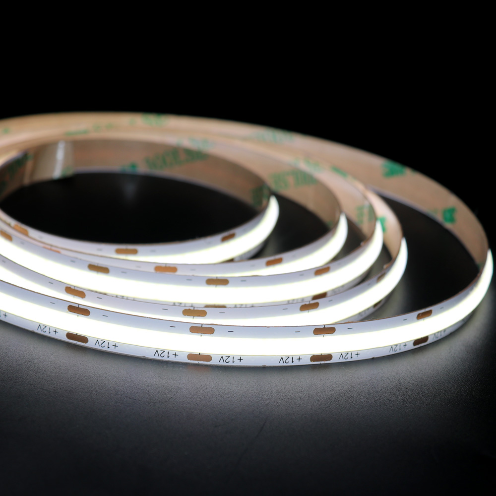 Flexible LED strip lights coiled for easy use, providing bright and uniform illumination for a variety of applications.