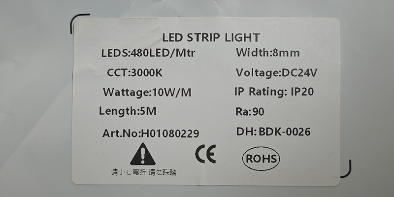 LED specs, 3000K, IP20 Product specifications label for LED strip light, detailing length, voltage, and wattage