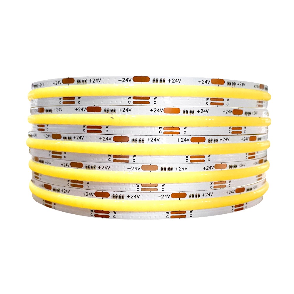 A roll of 24V COB LED strip lights with high density chips and flexible PCB, suitable for custom length cutting and uniform lighting applications