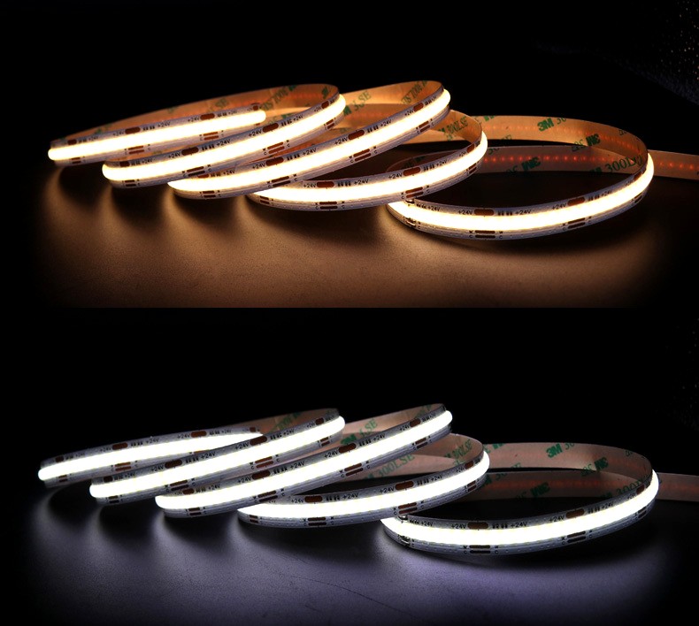Visual comparison of COB LED strip lights showing two color temperatures: warm white (top) and cool white (bottom), both coiled and lit on a dark surface.