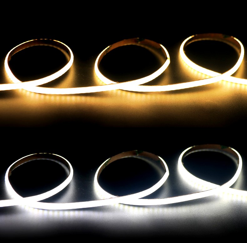 A comparison of warm white and cool white COB LED strip lights illuminating in a coiled layout, showcasing different color temperatures and brightness.