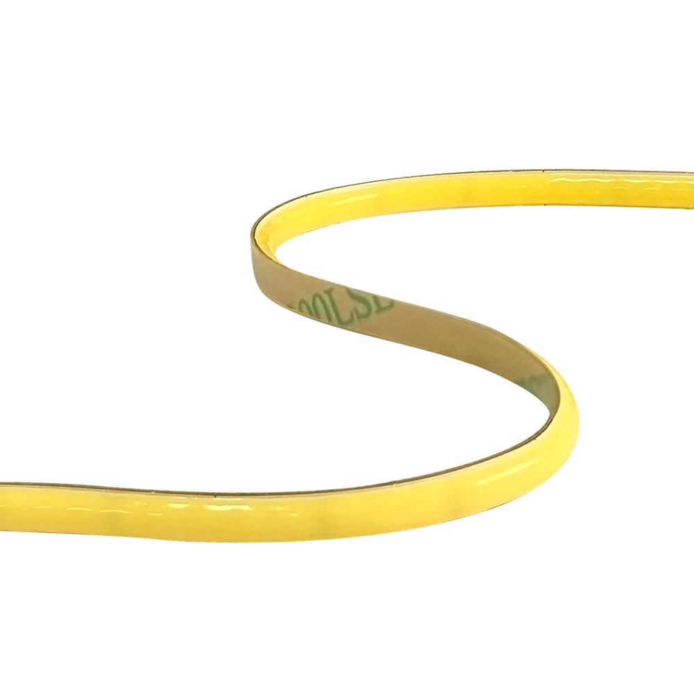 Close-up image of a yellow COB LED strip light in a flexible S-shape showing its bendable design and 3M adhesive backing.