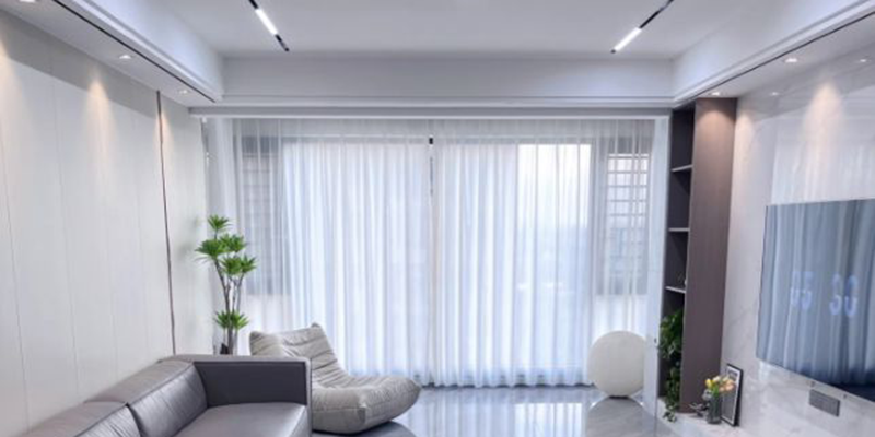 Spacious and modern living room Contemporary living room with sleek furniture, LED lighting, and a bright atmosphere