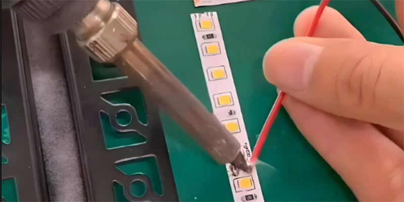 soldering wire to led strip light, manual connection process in factory