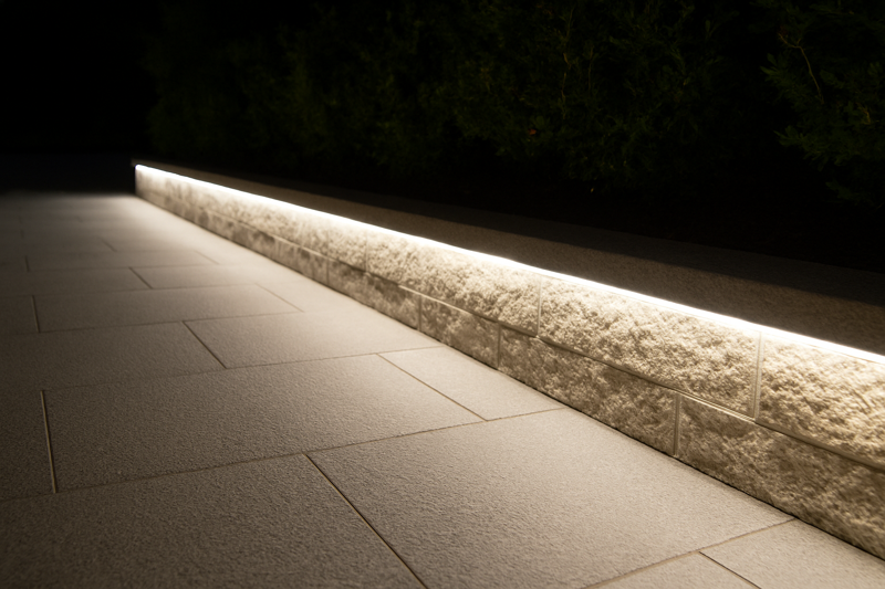 A bright, evenly lit outdoor pathway illuminated by an Rhlite LED strip using high-efficiency SMD 2835 chips
